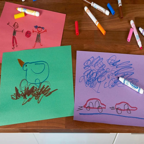Children's drawings on colored paper with Crayola Ultra Clean Washable markers 