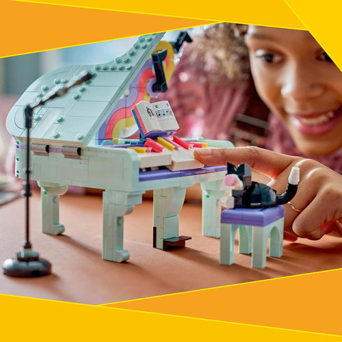 Child playing with lego 31392 music decor piano 